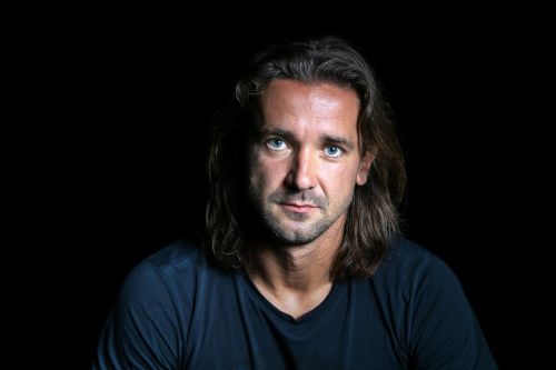 Radim Ottmar profilová fotografie na černém pozadí.